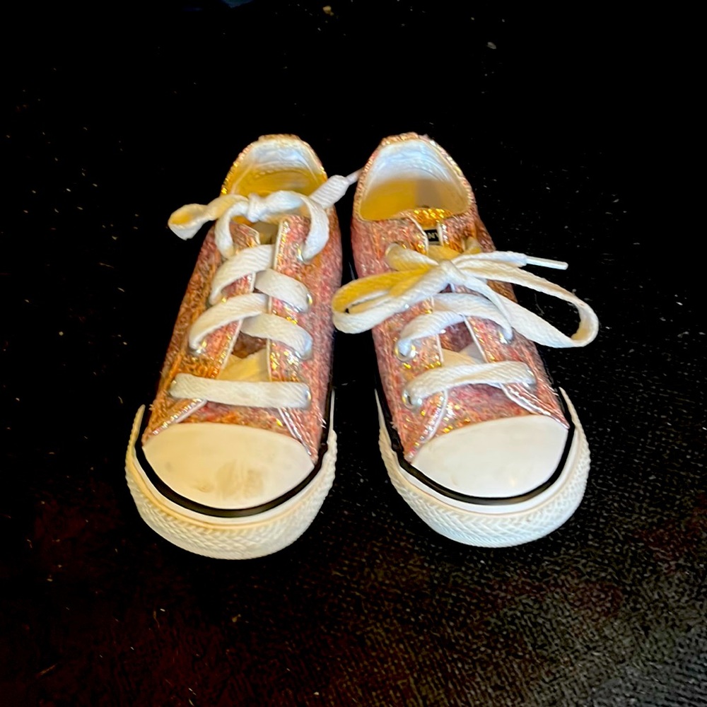 Pink and white converse
